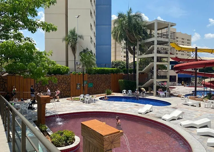 SUÍTE PARA ATÉ 4 PESSOAS EM GOLDEN DOLPHIN GRANDE HOTEL PISCINA 24h