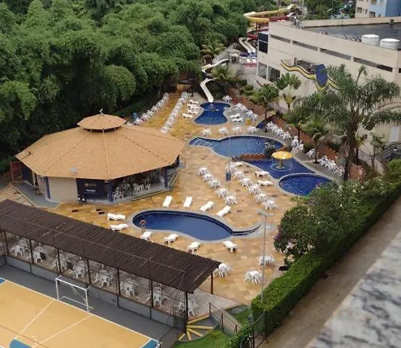 SUÍTE PARA ATÉ 4 PESSOAS EM GOLDEN DOLPHIN GRANDE HOTEL PISCINA 24h